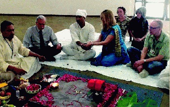 Take Your Seat for the <i>Puja</i>